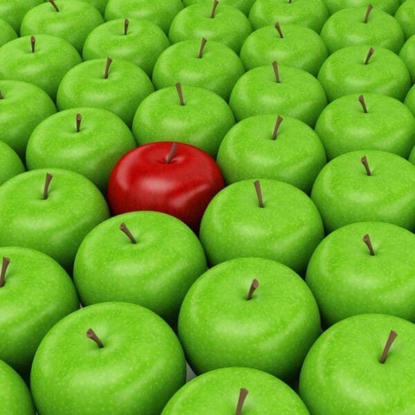 Stand out from crowd - red apple